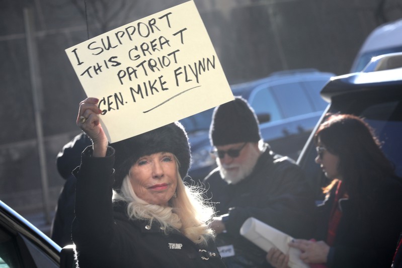Demonstrators gather for Flynn sentencing hearing at U.S. District Court in Washington