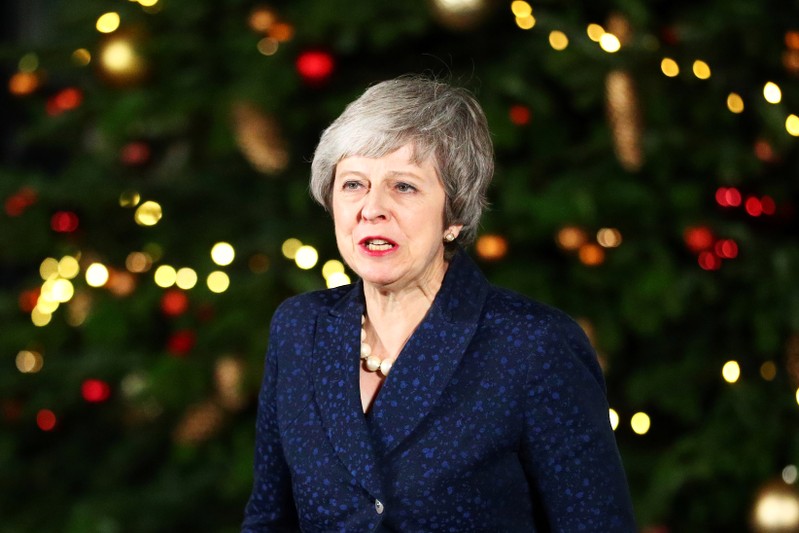 Britain's Prime Minister Theresa May speaks outside 10 Downing Street after a confidence vote by Conservative Party Members of Parliament, in London