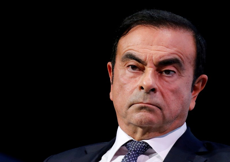 FILE PHOTO - Carlos Ghosn, chairman and CEO of the Renault-Nissan-Mitsubishi Alliance, attends the Tomorrow In Motion event on the eve of press day at the Paris Auto Show, in Paris