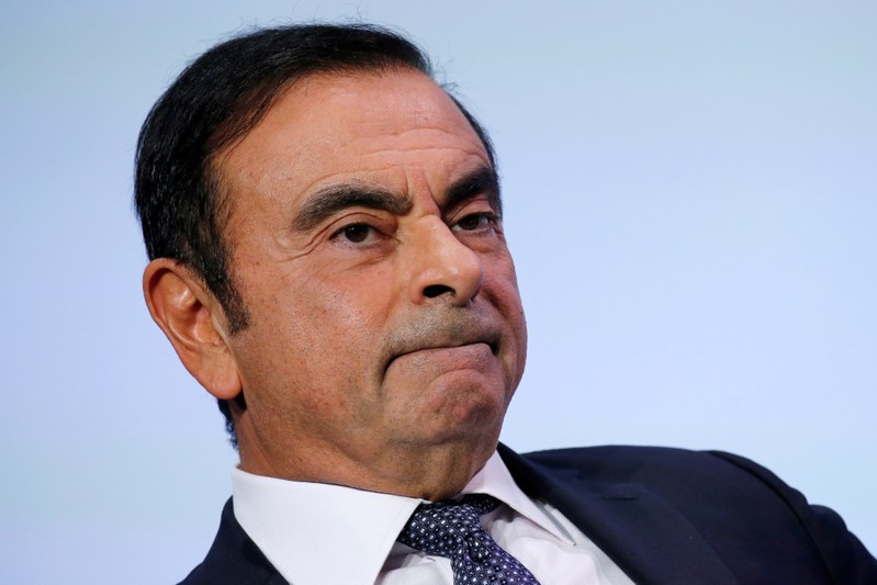 FILE PHOTO - Carlos Ghosn, chairman and CEO of the Renault-Nissan-Mitsubishi Alliance, attends at the Tomorrow In Motion event on the eve of press day at the Paris Auto Show, in Paris