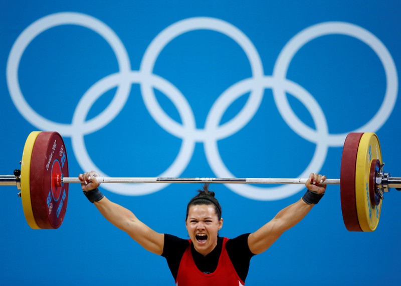 FILE PHOTO: Canada's Christine Girard competes on the women's 63Kg weightlifting competition at the ExCel venue at the London 2012 Olympic Games