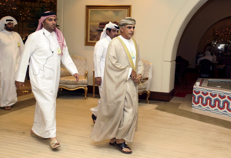 FILE PHOTO: Mohammed bin Hamad Al Rumhy, Oman's Minister of Oil and Gas, arrives to a meeting between OPEC and non-OPEC oil producers, in Doha