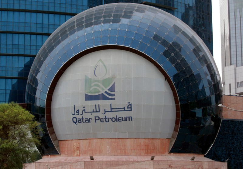 FILE PHOTO: The logo of Qatar Petroleum is seen at its headquarters in Doha