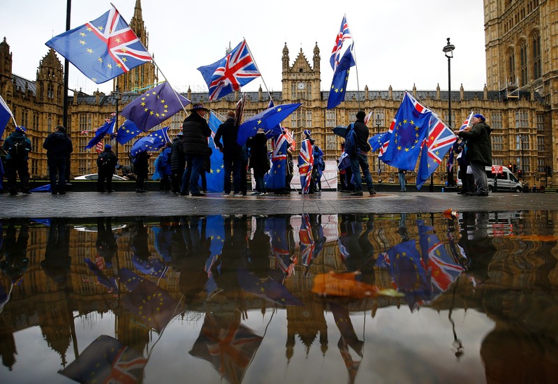 Anti-Brexit demonstrators protest outside the Houses of Parliament in London