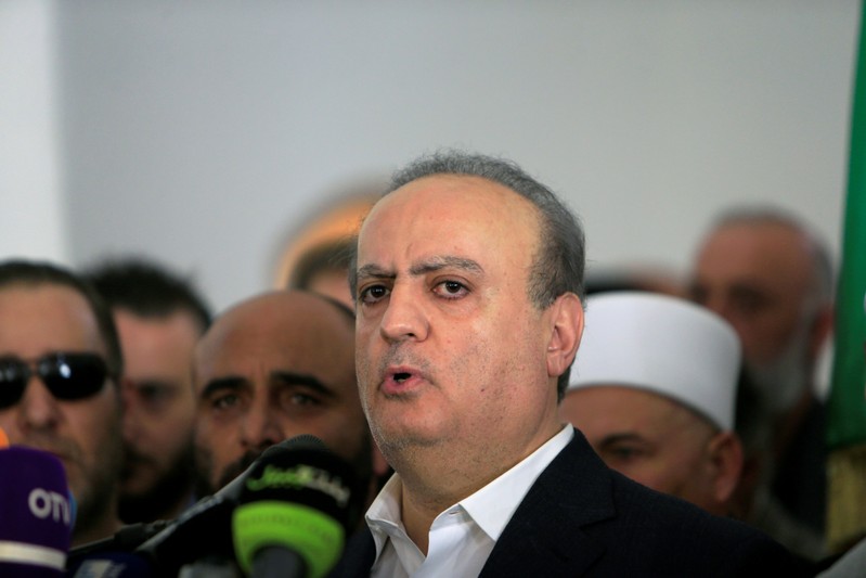 A pro-Syrian Druze politician Wiam Wahhab speaks during the funeral of his supporter in the village of al-Jahiliya