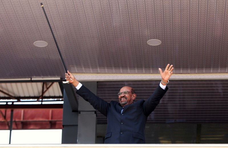FILE PHOTO - Sudan's President Omar al-Bashir waves to the crowds at the John Garang's Mausoleum in Juba