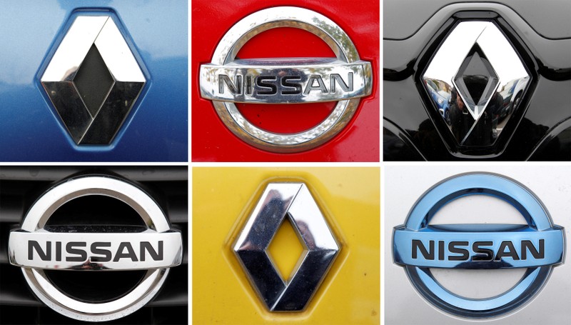 FILE PHOTO: A combination picture shows logos of Japan's Nissan and France's Renault on cars in Strasbourg