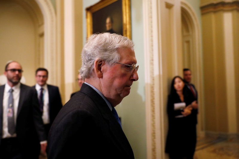 U.S. Senate Majority Leader McConnell arrives for Senate Republican weekly policy lunch on Capitol Hill in Washington