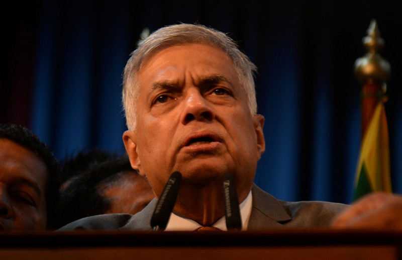 Sri Lanka's PM Wickremesinghe addresses his supporters and the party members after assuming duties in Colombo