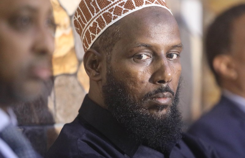 Former al Shabaab leader Mukhtar Robow attends a news conference in Baidoa