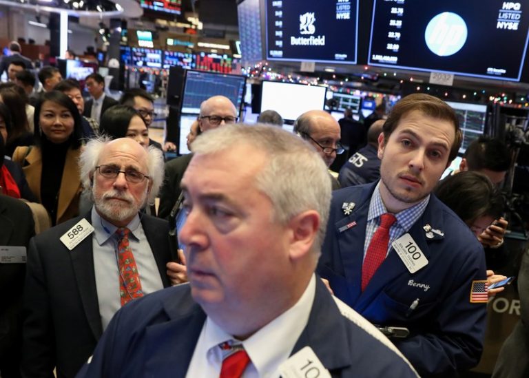 Tech stocks pull Wall St. lower, offseting jobs data bump