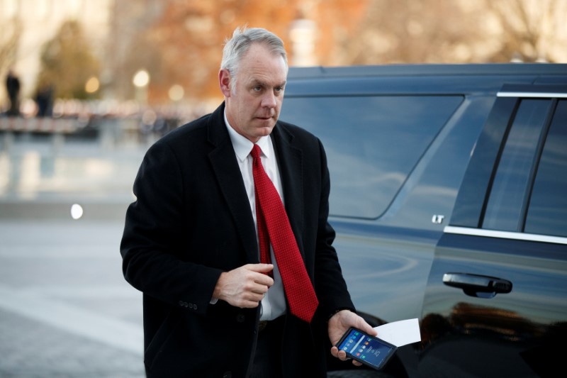 US Secretary of the Interior Ryan Zinke arrives at the US Capitol prior to the service for former President George H. W. Bush in Washington, DC, USA