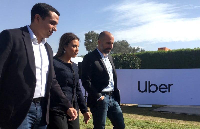 Dara Khosrowshahi, Uber CEO, walks with Egypt's Minister of Investment and International Cooperation, Sahar Nasr, after a news conference in Cairo