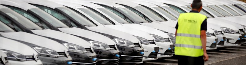 FILE PHOTO: New Volkswagen cars are seen at the Berlin Brandenburg international airport Willy Brandt (BER) in Schoenefeld