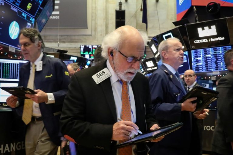 Wall Street drops 2 percent, spooked by growth and trade worries