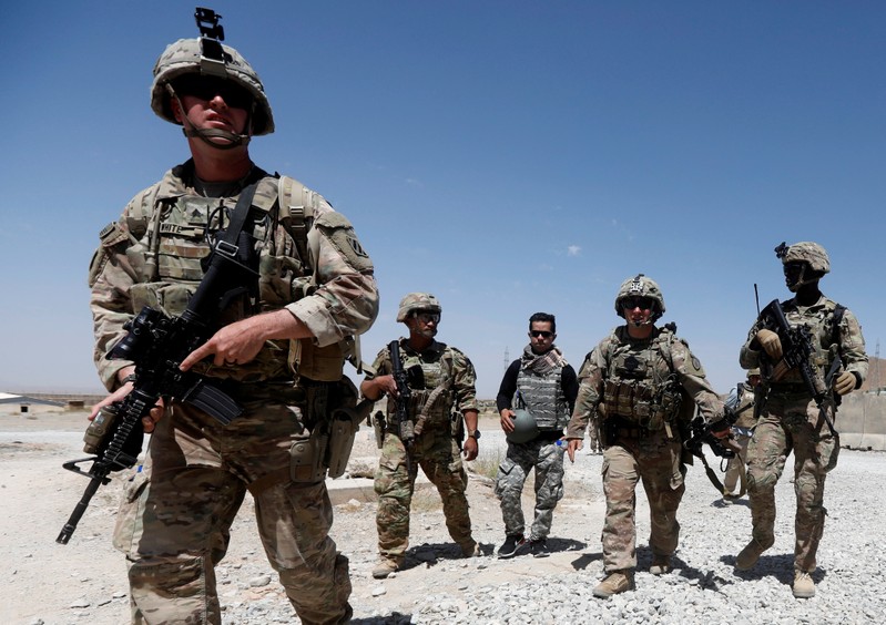 FILE PHOTO: U.S. troops patrol at an Afghan National Army (ANA) Base in Logar province, Afghanistan