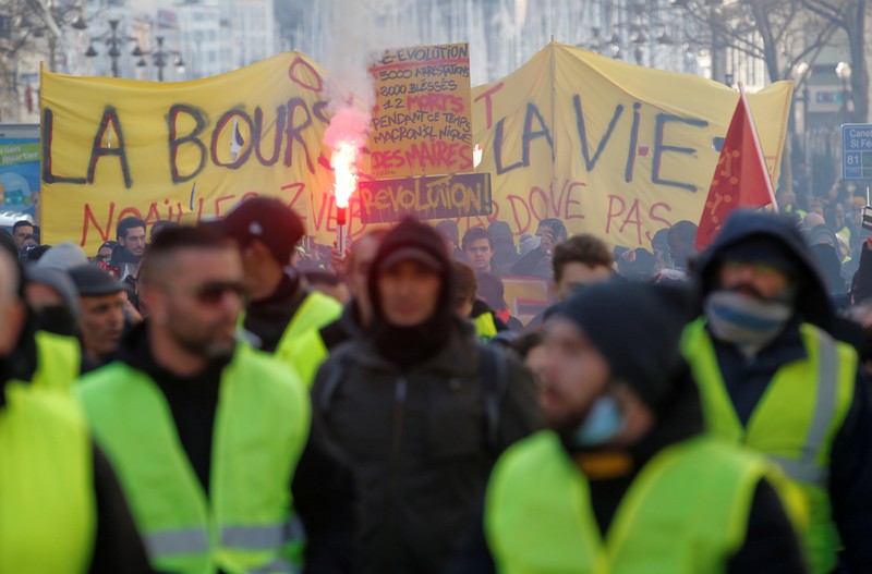 FILE PHOTO: Protesters wearing yellow vests take part in a demonstration of the 