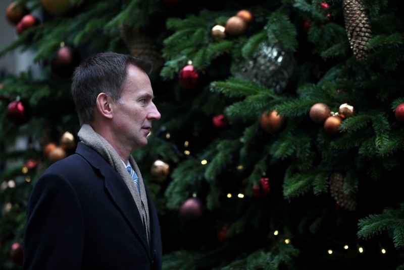 FILE PHOTO: Britain's Foreign Secretary Jeremy Hunt arrives in Downing Street, London