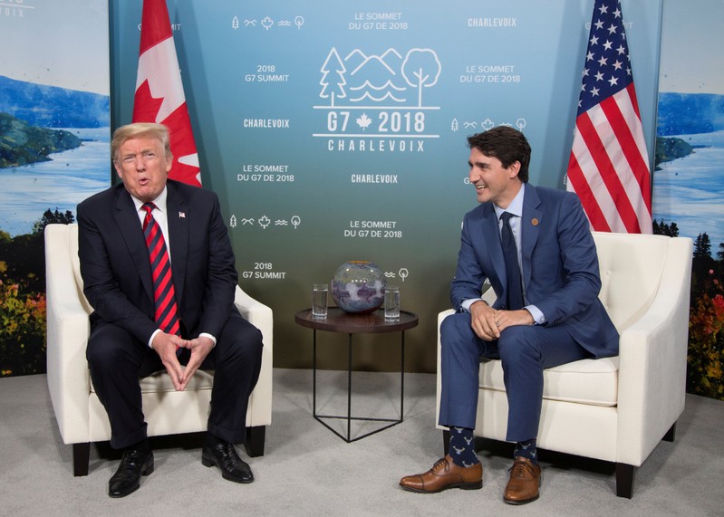 FILE PHOTO: Canada's Prime Minister Justin Trudeau meets with U.S. President Donald Trump during the G7 Summit in the Charlevoix town of La Malbaie, Quebec