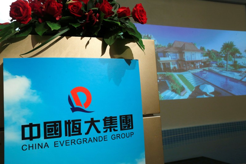 A promotional footage on a property development of China Evergrande Group is shown at a news conference in Hong Kong