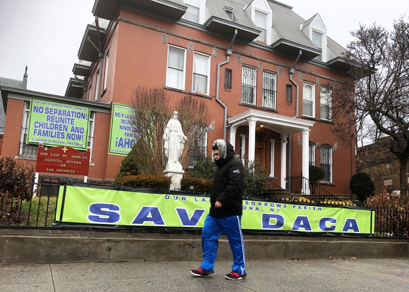 Banners outside a Catholic church in New York's Queens borough express support for 