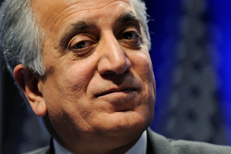 FILE PHOTO: Khalilzad listens to speakers during a panel discussion on Afghanistan at the Conservative Political Action conference (CPAC) in Washington