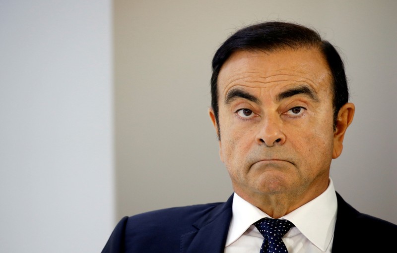 FILE PHOTO: Carlos Ghosn, chairman and CEO of the Renault-Nissan-Mitsubishi Alliance, attends a press conference on the second press day of the Paris auto show, in Paris