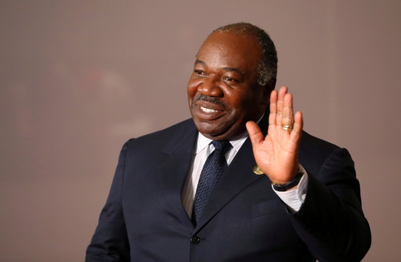 FILE PHOTO: Gabonese President Ali Bongo Ondimba arrives for a group picture at the BRICS summit meeting in Johannesburg