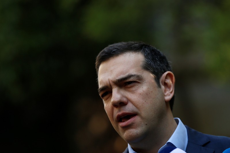 Greek PM Tsipras makes statements to the press following his meeting with resigned coalition partner Panos Kammenos in Athens