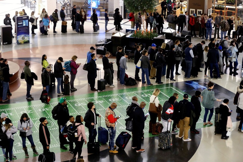 Long lines are seen at a TSA security checkpoint at Hartsfield-Jackson Atlanta International Airport amid the partial federal government shutdown, in Atlanta