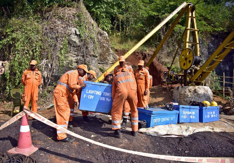 FILE PHOTO: Rescuers work at the site of a coal mine that collapsed in Ksan