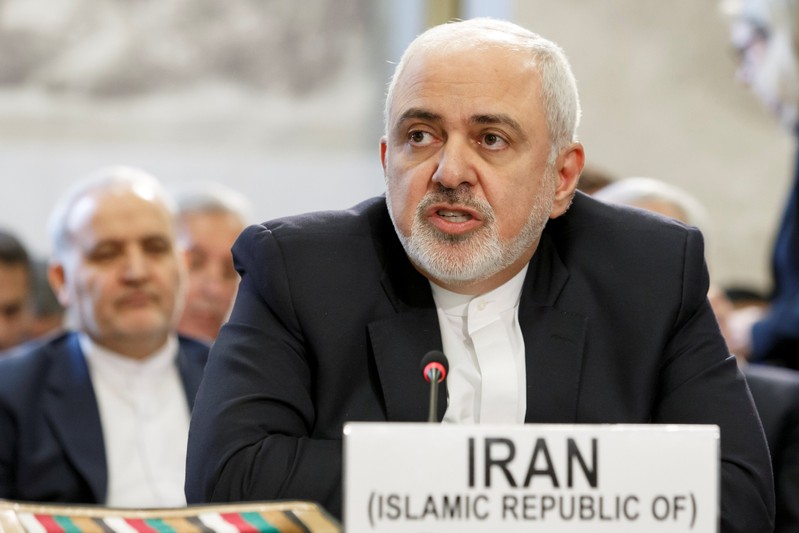 Iranian Foreign Minister Mohammad Javad Zarif delivers his statement, during the Geneva Conference on Afghanistan, at the European headquarters of the United Nations in Geneva