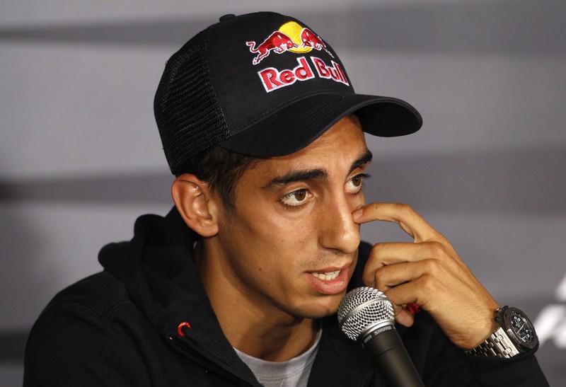 Toro Rosso Formula One driver Buemi of Switzerland speaks during a news conference in Spa Francorchamps