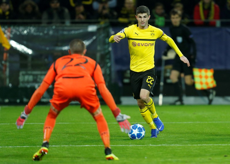 FILE PHOTO: Christian Pulisic in action for Borussia Dortmund
