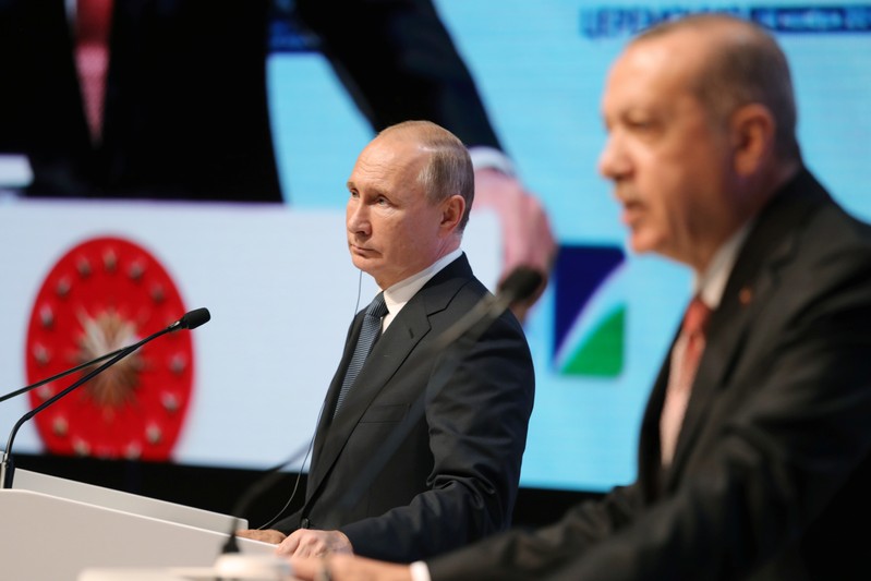 FILE PHOTO: Russian President Putin and his Turkish counterpart Erdogan attend a ceremony to mark the completion of the sea part of the TurkStream gas pipeline in Istanbul