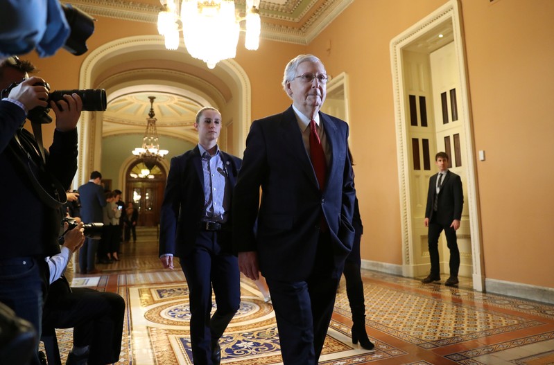 Senate Majority Leader McConnell leaves the Senate after failure of competing proposals to end government shutdown at the U.S. Capitol in Washington