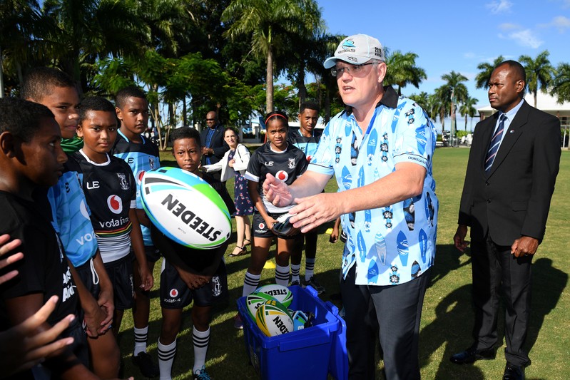 Australian Prime Minister Scott Morrison meets with young rugby league players in Suva