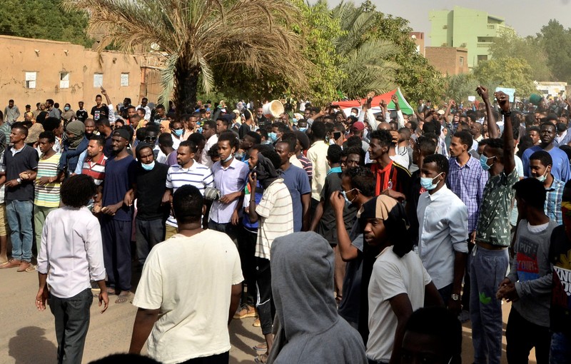 Sudanese demonstrators gather as they participate in anti-government protests in Khartoum