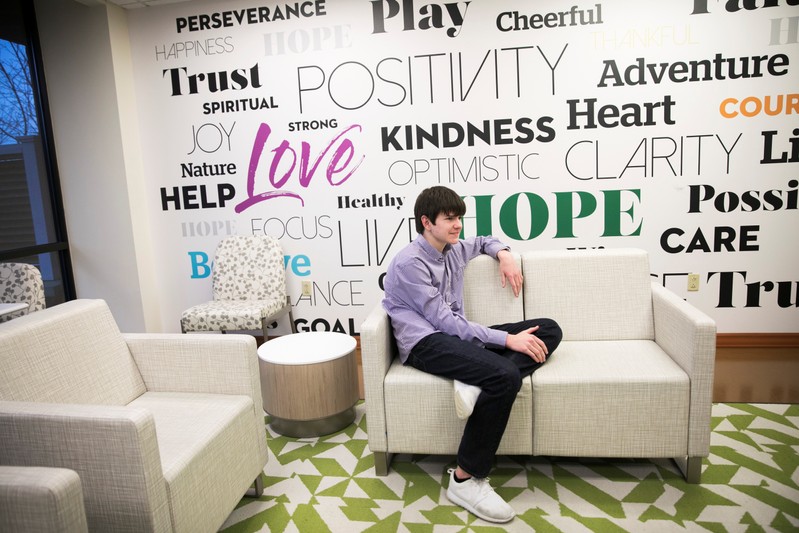 Danny Reagan sits in a common room at the Lindner Center of Hope in Mason