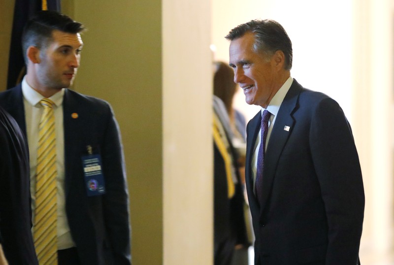 FILE PHOTO: U.S. Senator-elect Romney arrives for Senate Republican Conference meeting to elect leaders for 116th Congress on Capitol Hill in Washington