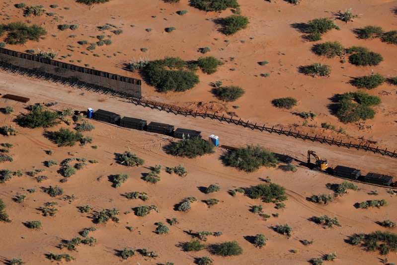 FILE PHOTO: Construction on the border wall with Mexico (top) is shown in New Mexico near Sunland Park, New Mexico