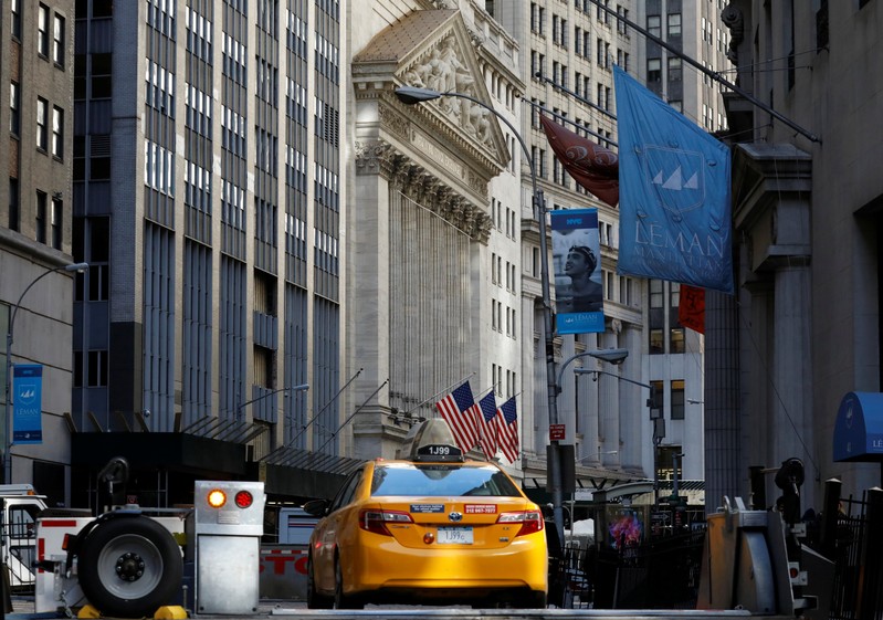 A taxicab enters the financial district security zone near the New York Stock Exchange (NYSE) in New York City