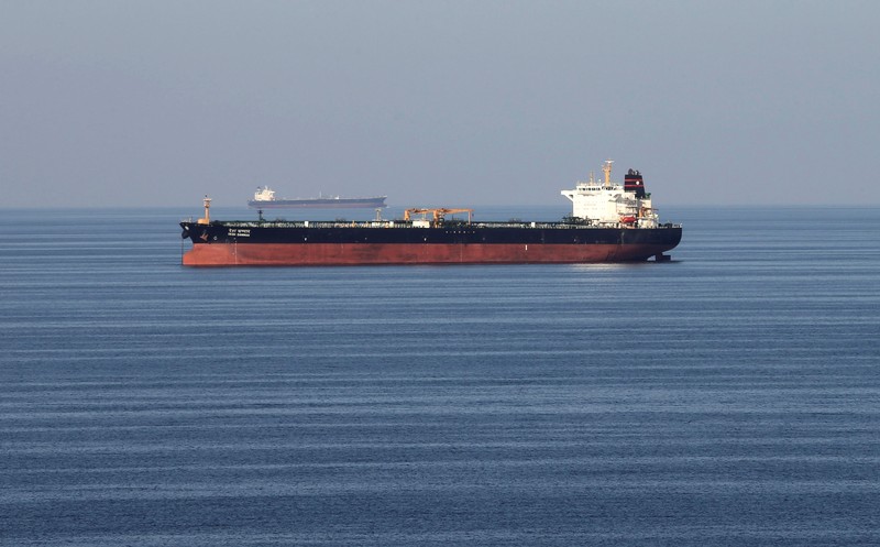 Oil takners pass through the Strait of Hormuz