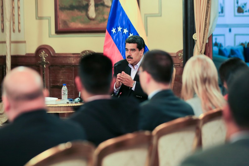 Venezuela's President Nicolas Maduro attends a meeting with members of the Venezuelan diplomatic corp after their arrival from the United States, at the Miraflores Palace in Caracas