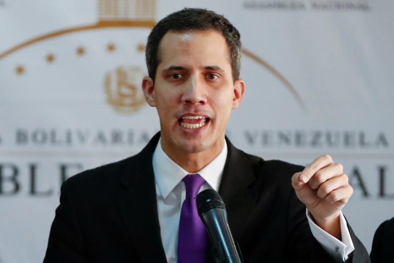 FILE PHOTO: Juan Guaido, President of the Venezuelan National Assembly and lawmaker of the opposition party Popular Will (Voluntad Popular), speaks during a news conference in Caracas