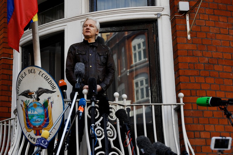 WikiLeaks founder Julian Assange is seen on the balcony of the Ecuadorian Embassy in London