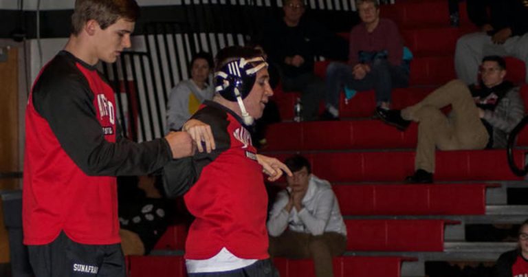 Wrestler with disabilities inspires at match