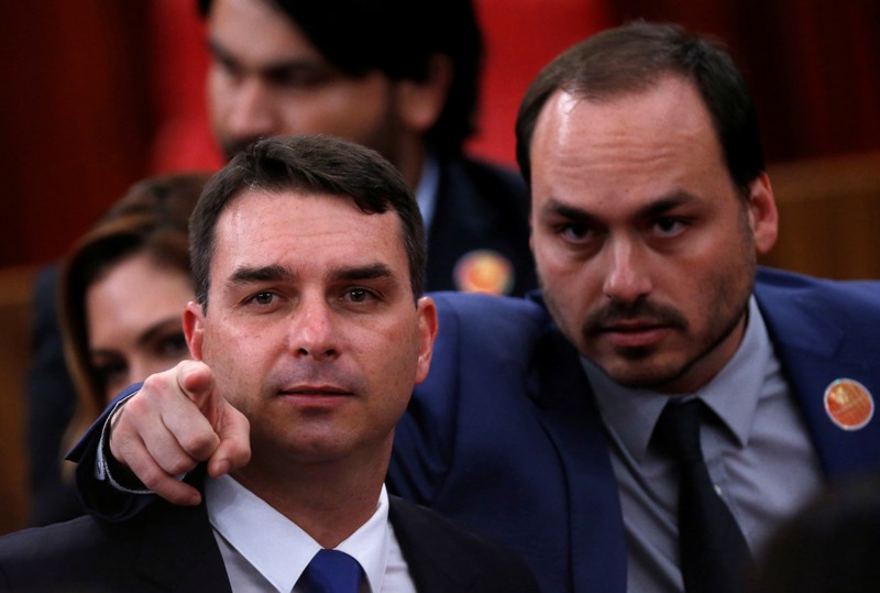 Flavio Bolsonaro and Carlos Bolsonaro, sons of the Brazil's President-elect Jair Bolsonaro are seen before their father received a confirmation of his victory in the recent presidential election in Brasilia