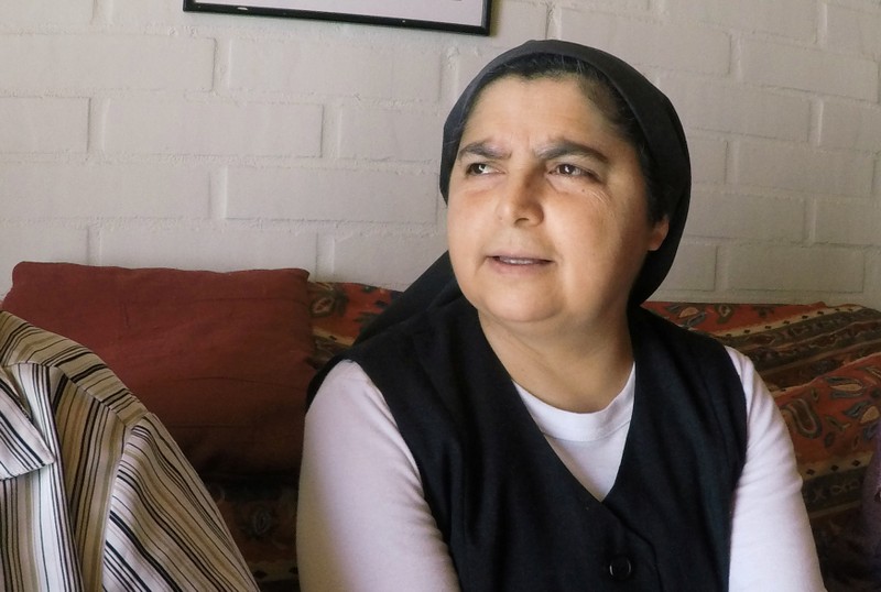 The former nun Yolanda Tondreaux speaks during an interview with Reuters in Talca