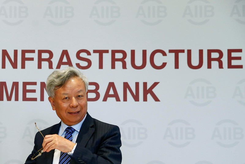 FILE PHOTO: Asian Infrastructure Investment Bank (AIIB) President Jin Liqun attends a news conference at the AIIB headquarters in Beijing